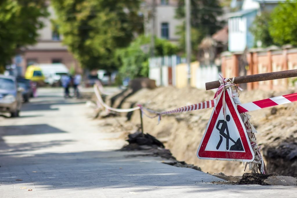 Construction roadwork on street in city