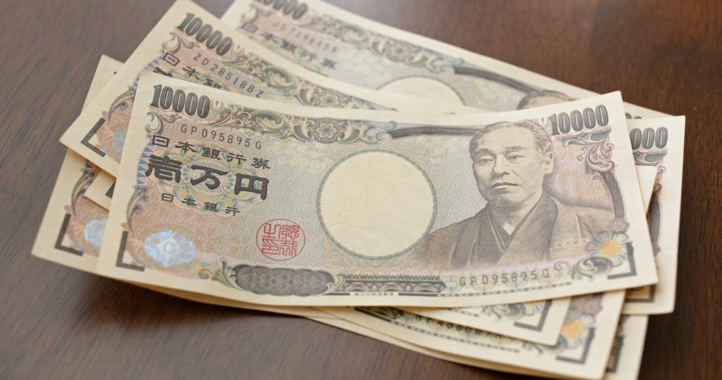 Counting Japanese Yen banknote