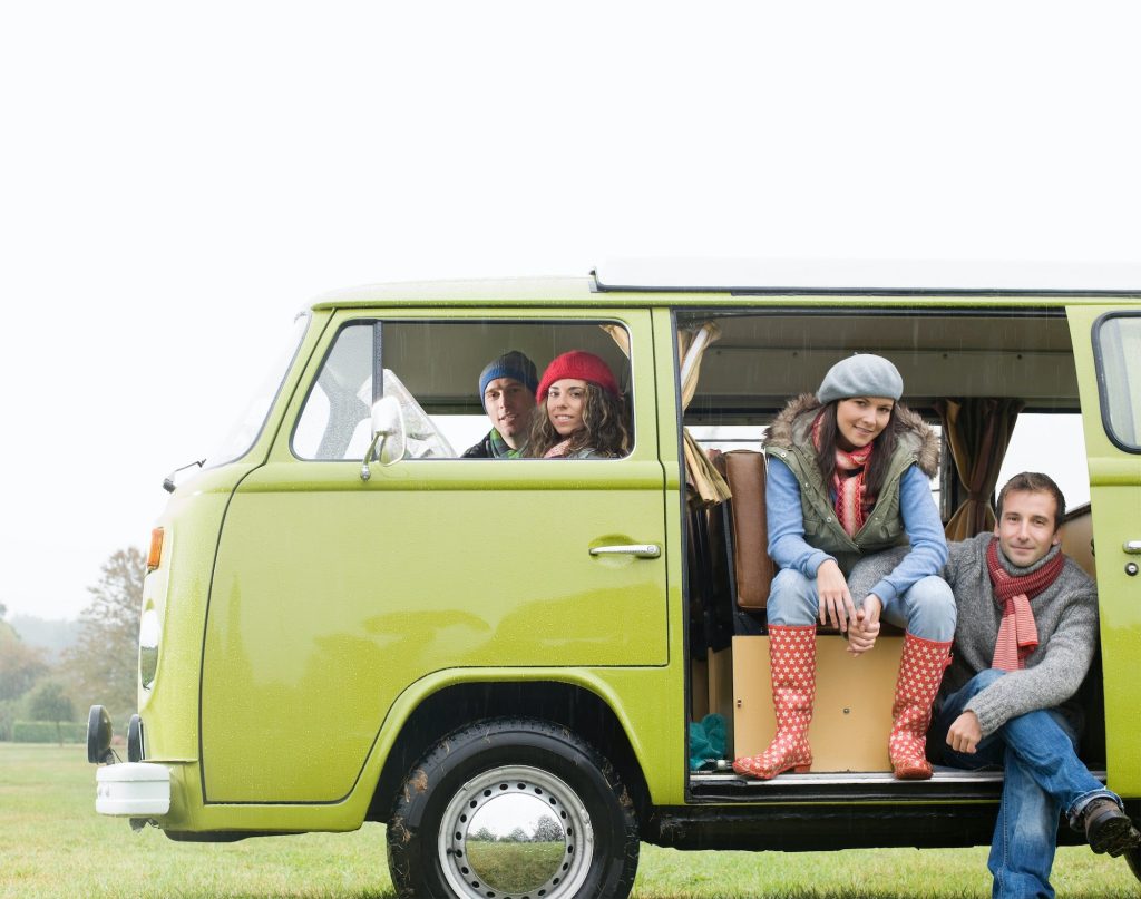 Couples looking out of camper van