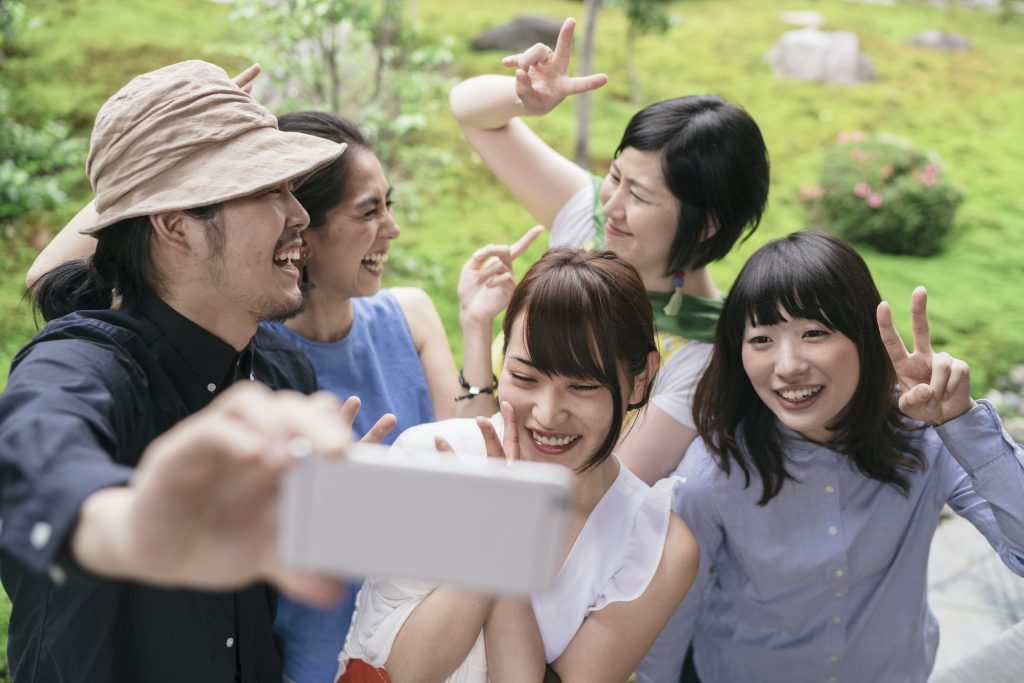 Group of Japanese tourists taking pictures
