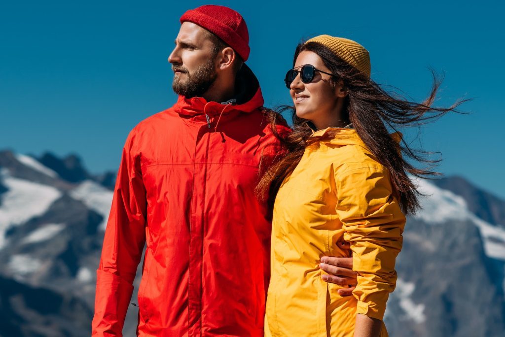 Portrait of travelers against the background of mountains