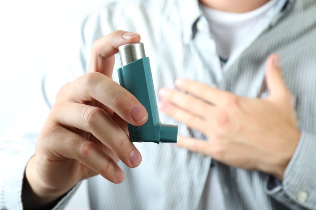 young-man-holds-asthma-inhaler-during-asthma-attack-1024x682-6800517