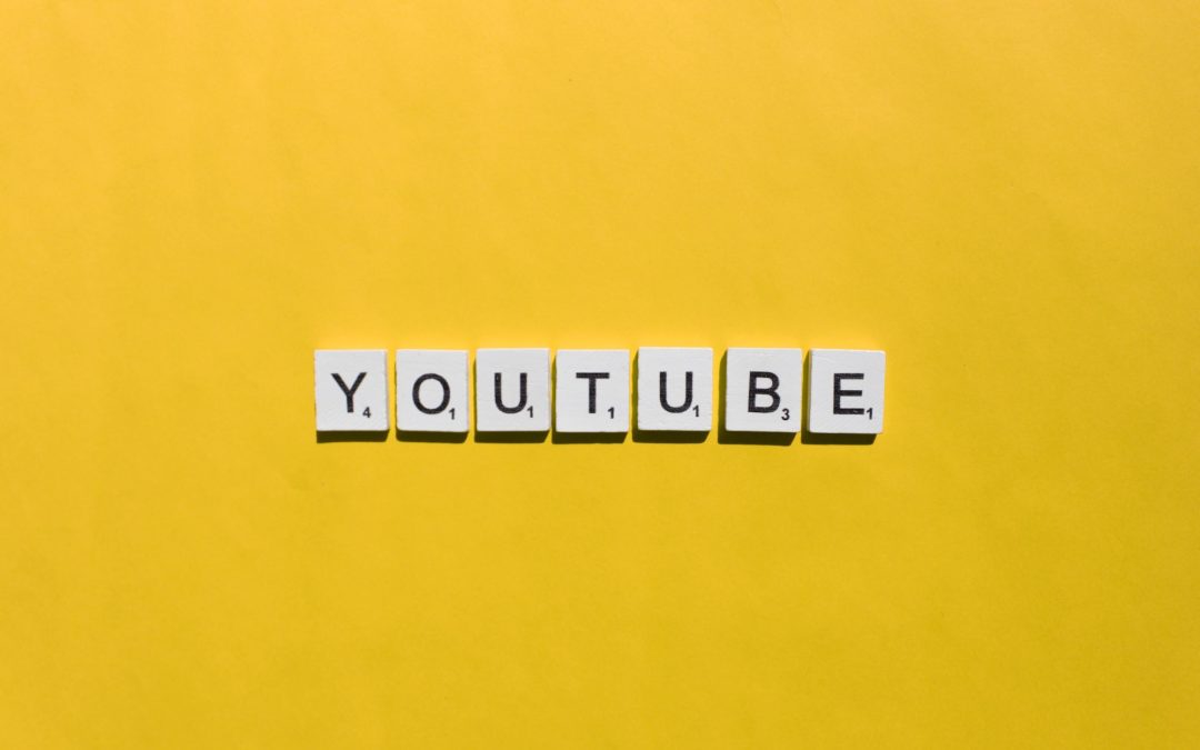 YouTube scrabble letters word on a yellow background